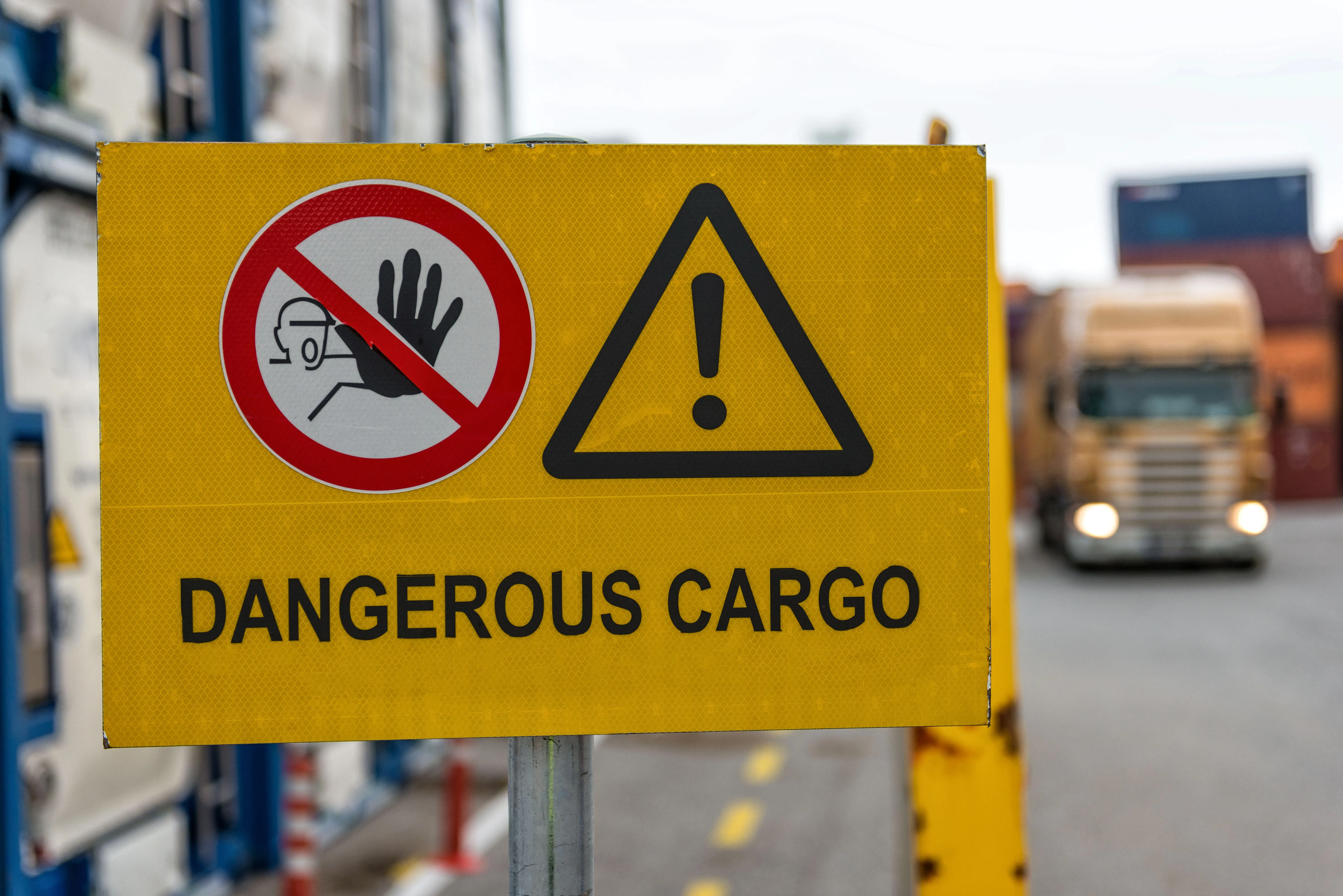 signs-warn-of-job-security-sign-dangerous-cargo-2022-11-14-09-36-15-utc.webp